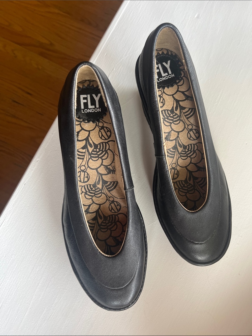Fly London Black Leather Rounded Toe Slip-On Flats
